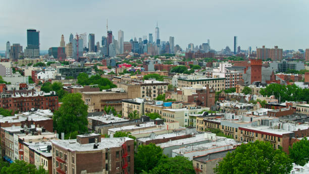istock Brooklyn Rooftops and Manhattan Skyscrapers - Aerial 1349204472