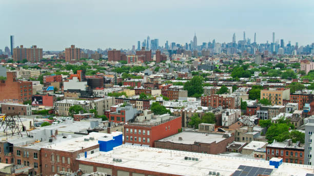 istock Aerial View Across Brooklyn Towards Manhattan Skyline 1349204474