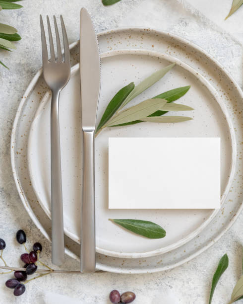 istock Wedding Table place with a card decorated with olive branches 1349204486