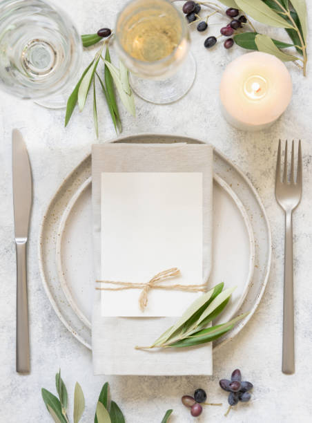 istock Wedding Table place with a card decorated with olive branches 1349204505