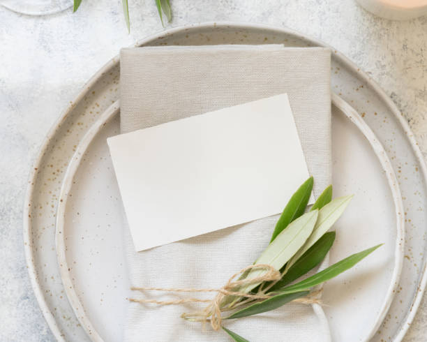 Wedding Table place with a card decorated with olive branches