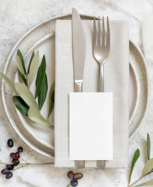 istock Wedding Table place with a card decorated with olive branches 1349204518