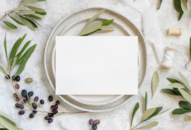 istock Wedding Table place with a card decorated with olive branches 1349204526