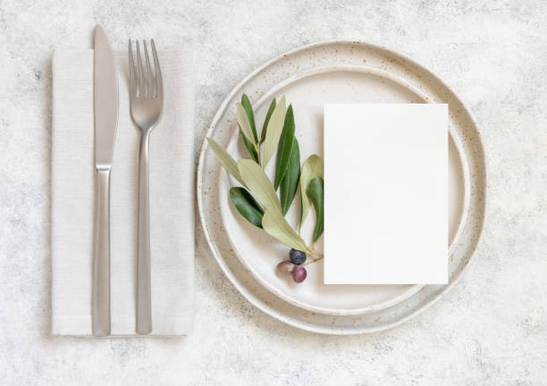 istock Wedding Table place with a card decorated with olive branches 1349204527