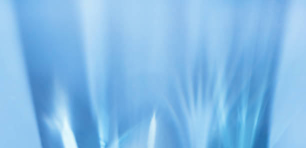 istock refraction of light from glass glare of light on a blue surface 1349207520