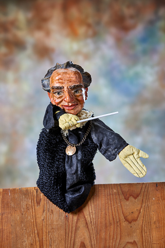 Vintage hand puppet from the 1930s, the conductor