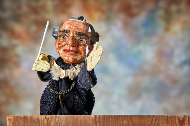 istock Vintage hand puppet from the 1930s, the conductor 1349209094