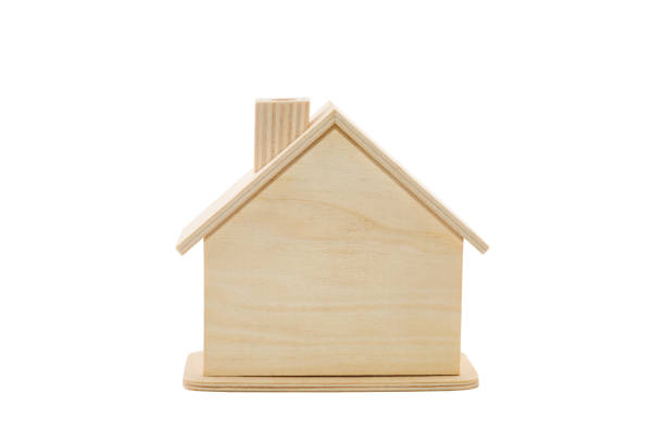 istock Wooden house shape isolated on white background with clipping path 1349220059