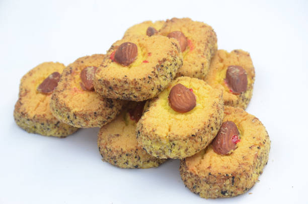istock the yellow biscuit with almond isolated on white background. 1349221067