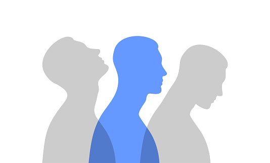 Blue male silhouette in profile with a gray transparent projections. Mental health concept. Duality and hidden emotions