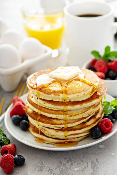 istock Fluffy buttermilk pancakes with syrup 1349223752