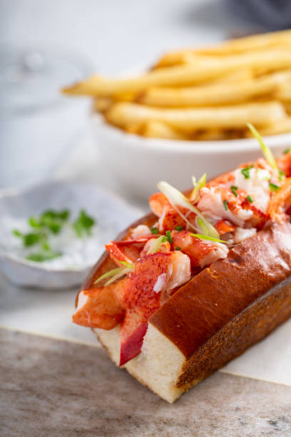 istock Lobster roll with fries on a marble board 1349223761