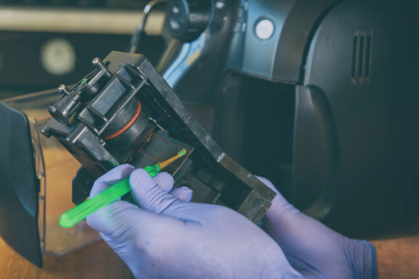 istock A repairman repairs a broken coffee maker 1349224379