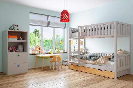 Modern Childroom Interior With Bunkbed, Table, Cabinet And Garden View From The Window.