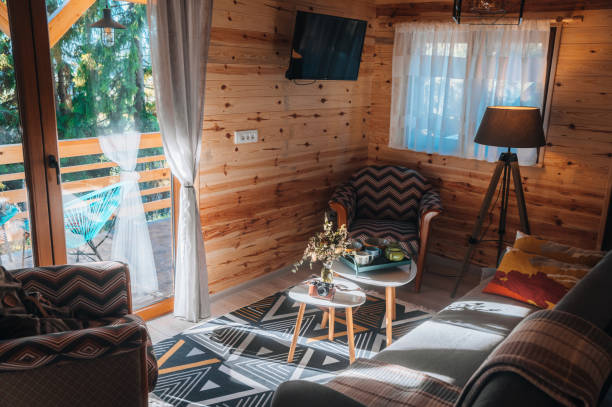 istock Cute small bright chalet in the forest 1349225159