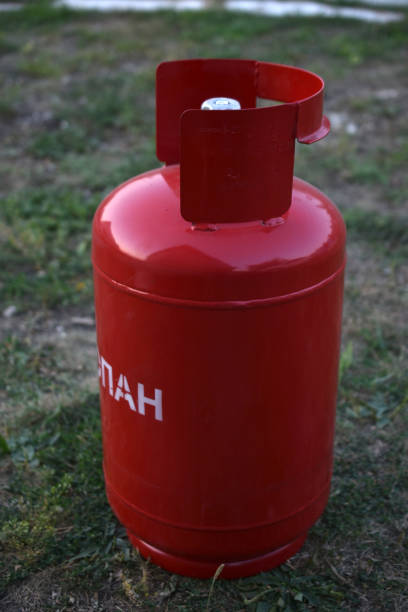 istock Red gas household bottle with shiny valve 1349226513