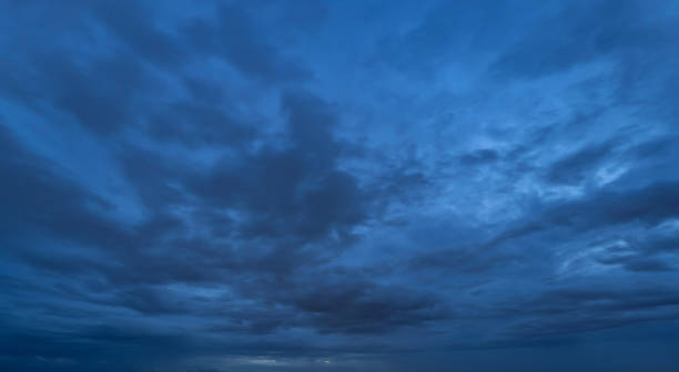 istock Dramatic dark blue clouds sky with thunder storm and rain at night. Abstract nature landscape background. 1349229510
