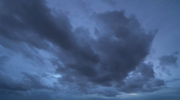 istock Dramatic dark blue clouds sky with thunder storm and rain at night. Abstract nature landscape background. 1349229521