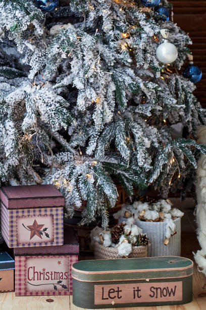 istock Christmas background with gift boxes on floor under Christmas tree at home, copy space. Winter holidays, family concept 1349231200