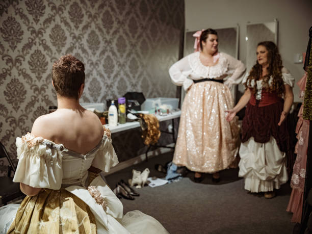 istock Three Actresses in period costume in dressing room 1349231402