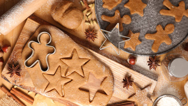 istock making christmas cookies- raw dough and mold 1349232363