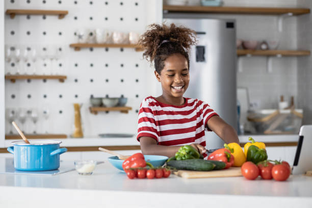 istock Girl preparing a healthy meal 1349233022
