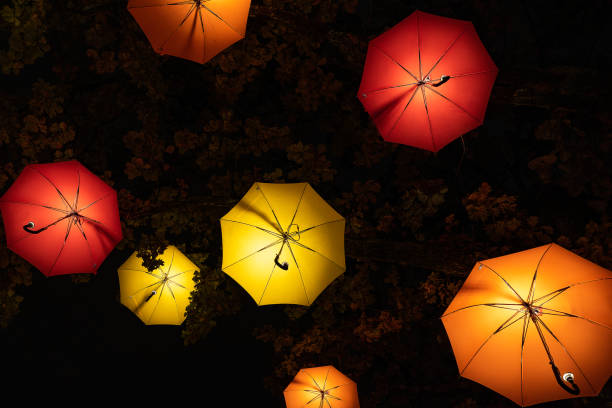 Colorful umbrella glowing in the dark
