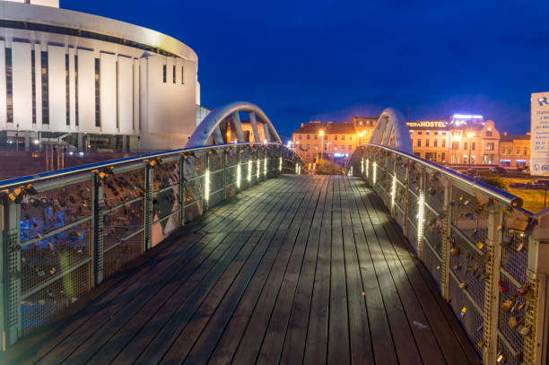 Bydgoszcz, Poland - July 25, 2021: Jan Kiepura Bridge (formerly: Bridge of love in Bydgoszcz) at dusk.