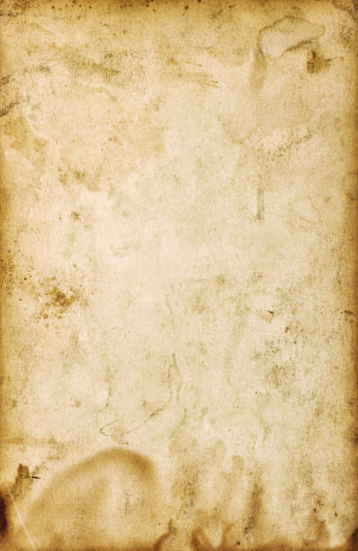 istock Used paper background Grungy stained texture 1349236876