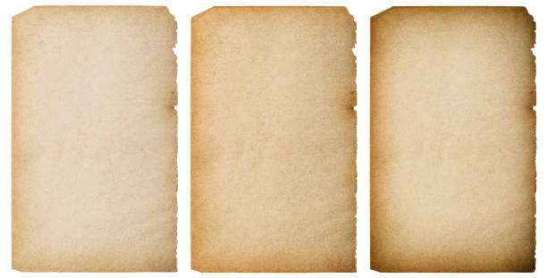 istock Old grungy paper sheet texture background torn edges isolated 1349236888