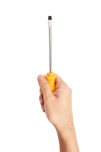 hand holding screwdriver (clipping path) on the white background - holding screwdriver imagens e fotografias de stock