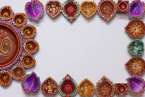 istock Eco Friendly Handmade Handcrafted earthen large or big floral Clay Diya Deep Dia arranged as border frame background with copy space 1349247761
