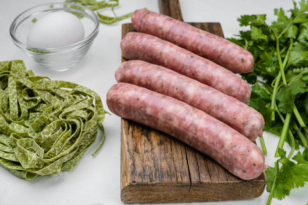 istock Easy sausage carbonara ingredients, on white stone table background 1349247839