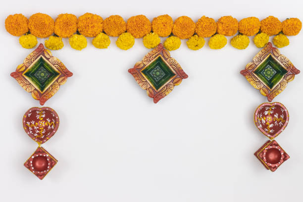 istock Border frame designed using Handcrafted Eco Friendly Clay Diya Deep Dia with Marigold background with copy space 1349247847