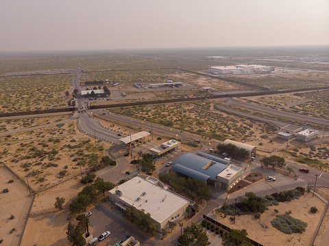 United States Mexico Border Aerial at Santa Teresa New Mexico and Juárez Chihuahua Mexico on a hazy Sunny late afternoon