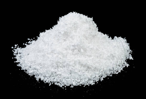istock Pile of white snow on black background. White snow hill. 1349248632