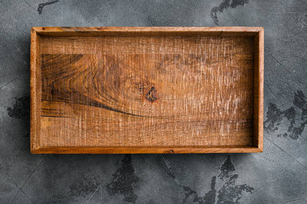 istock Empty dark wooden box with copy space for text or food, top view flat lay , on gray stone table background 1349249461