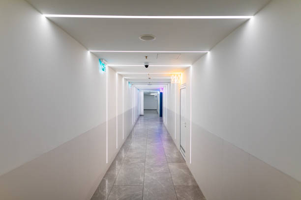 istock Modern public toilet hallway with neon lights 1349250936