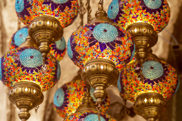 istock Middle Eastern lambas of different colors and sizes are hanging in the bazaar. 1349251185