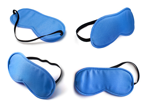 Collection of blue sleeping masks, isolated on white background