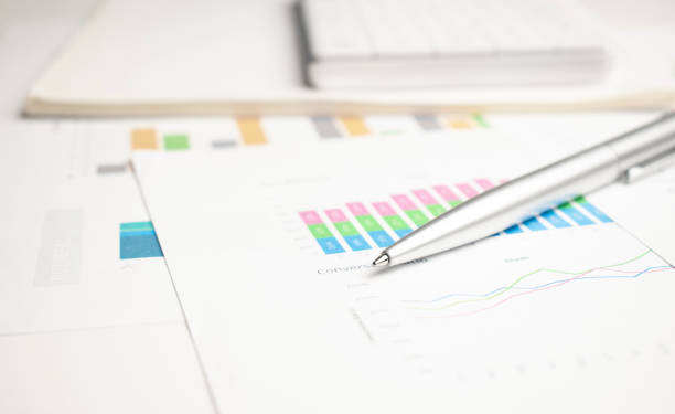 istock Finance analysis concept - a chart with a pen and a calculator 1349253277
