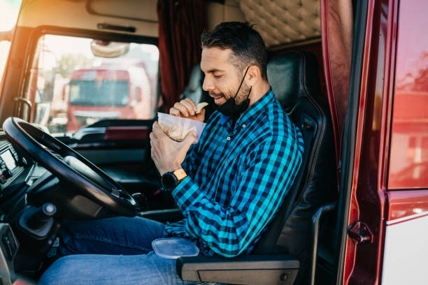120+ Eating Truck Driver Stock Photos, Pictures & Royalty-Free Images - iStock