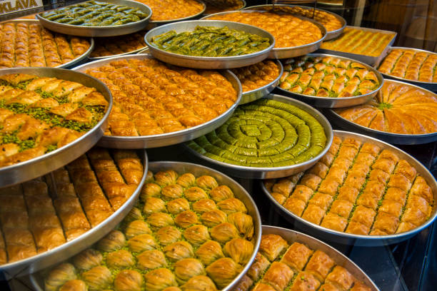 Baklava varieties on dessert store. Turkish baklava on tray.