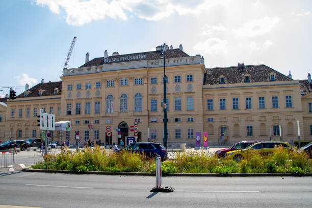 Vienna, Austria - April 3, 2015: Michaelerplatz in Vienna and people looking at the medieval remains. Foundations of Roman settlement and remains of the walls of the Garden of Paradise