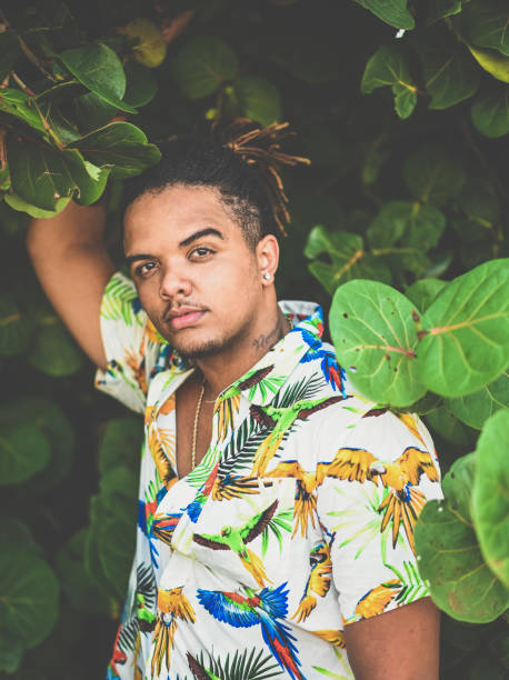 istock Cool young Black man in tropical vacation style shirt 1349255719