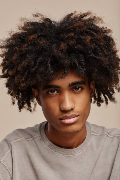 istock Young Man with Natural Hair 1349257976