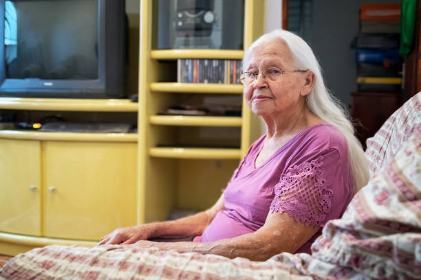 istock Elderly woman at home 1349258444