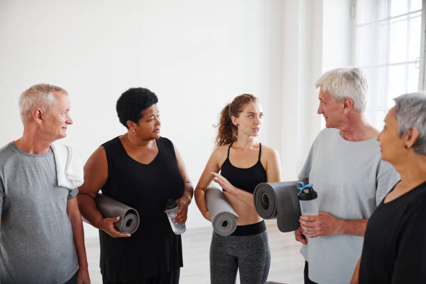 istock Seniors people talking to coach after classes 1349259662