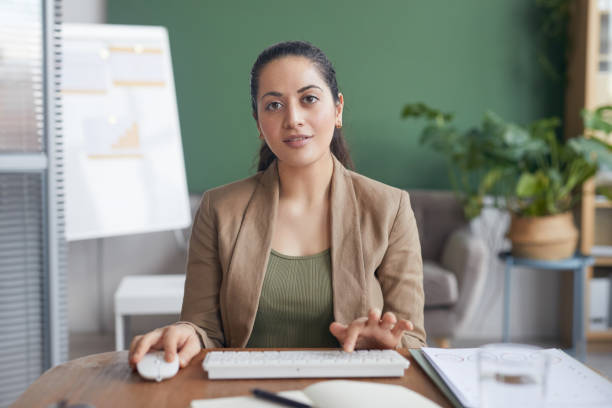 istock Modern Businesswoman using PC at Workplace 1349260909