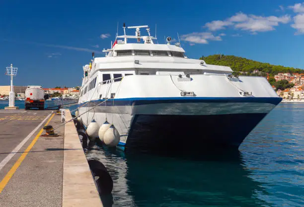 Passenger ferry near the pier in the seaport. Split Croatia.
